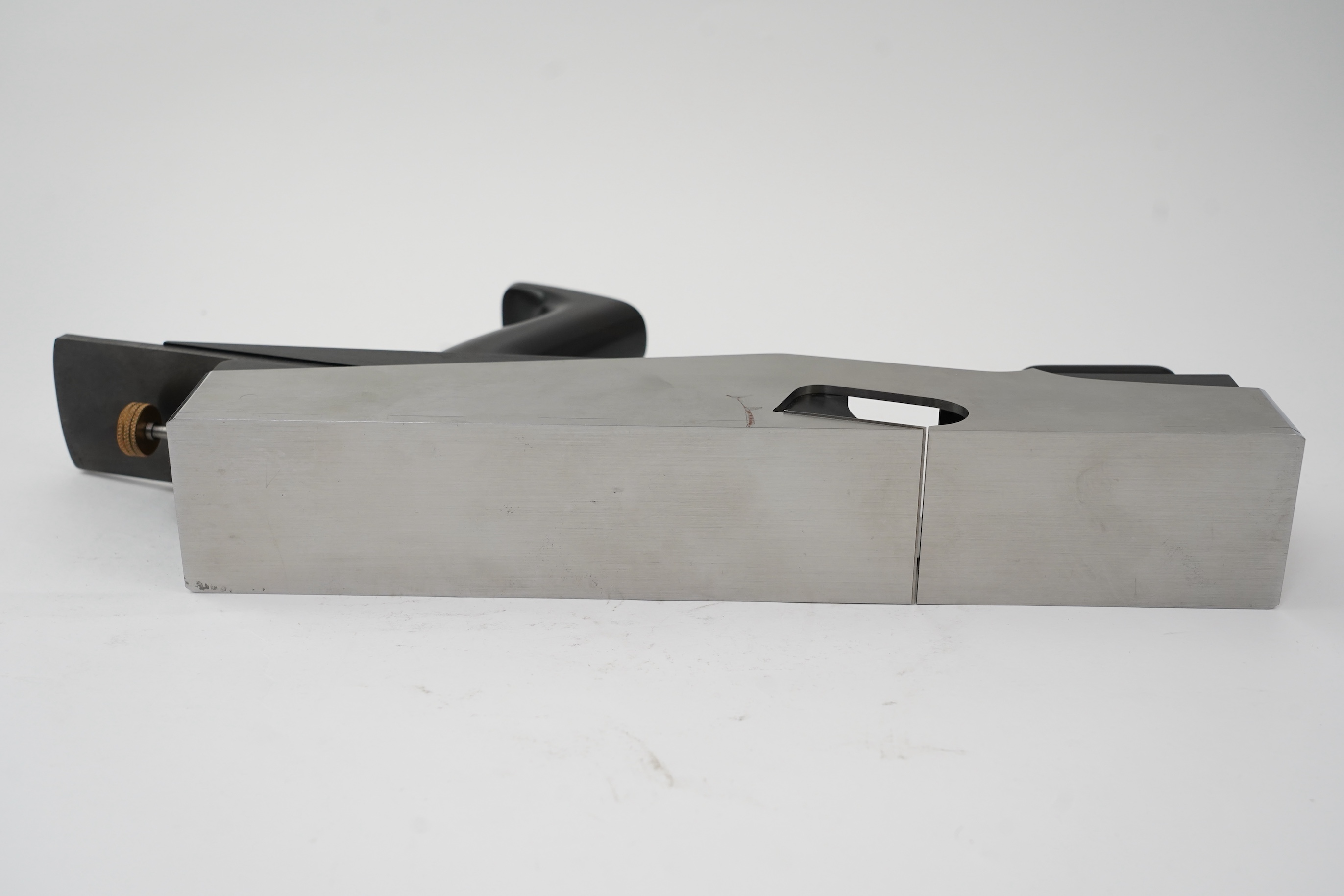 A very fine modern rebate mitre plane by Sauer & Steiner Toolworks, Ontario, handmade in the style of a Norris rebate mitre plane, with ebony infill, handle and wedge, adjustable iron, the handle on an adjustable lateral
